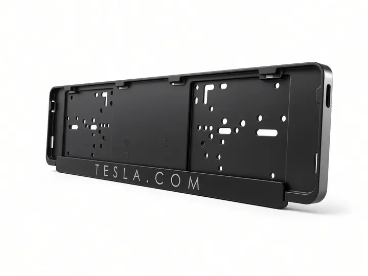Tesla license plate frame with TESLA.COM lettering